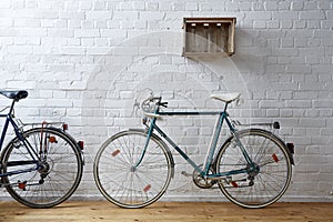 Vintage bicycle in white brick studio
