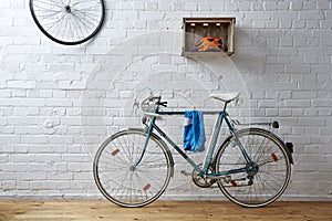 Vintage bicycle in white brick studio