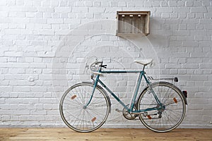 Vintage bicycle in whitebrick studio