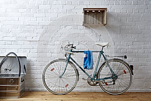 Vintage bicycle in whitebrick studio