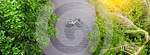 Vintage bicycle on wooden floor at Sri Nakhon Khuean Khan Park a