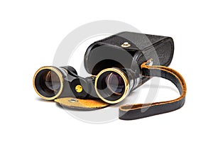 Vintage binoculars with leather case isolated on white
