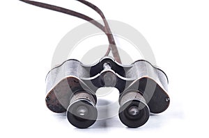 Vintage binoculars on a white background, isolate