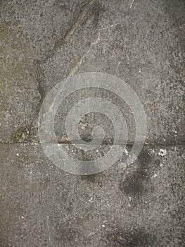 Vintage black and white background with distressed grunge textured wall paint and spattered stain design