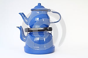 Vintage blue ceramic teapot isolated on white background,