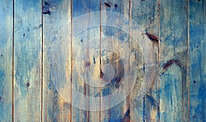 Vintage blue wood texture background with knots and nails