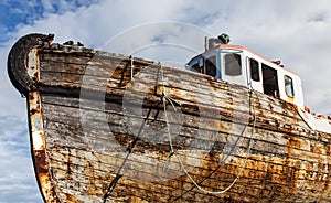 Vintage boat resting in dry dock