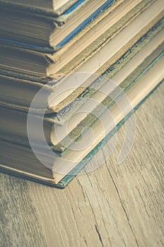 Vintage book corners on wood