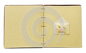 Vintage book open with envelope