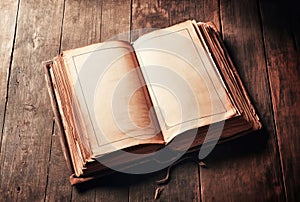 Vintage book, open, on old wooden table, with clipping path. Open Book blank on old wooden background. book with blank pages