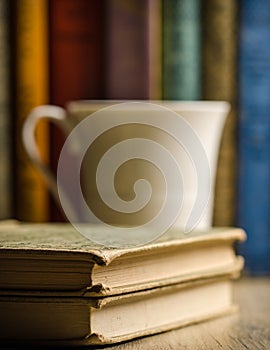 Vintage books with mug