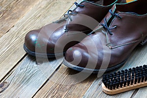 Vintage boots, brush and shoe polish