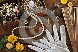 Vintage box with trinkets and jewelry photo