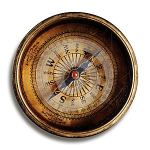 Vintage brass compass isolated on black background