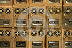 Vintage brass mailbox doors with dials and windows