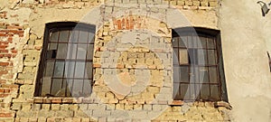 Vintage brick wall with old wooden frame window