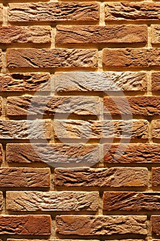 Vintage brown cracked brick wall texture