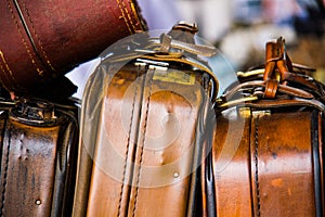 Vintage brown leather suitcases.