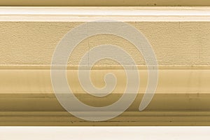 Brown painted cement wall with rough surface texture and background seamless