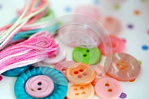 Vintage Buttons and Needlepoint Thread Closeup