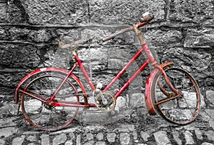 Old bycicle on a wall