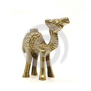 a vintage camel figure carved with beautiful details in golden brass