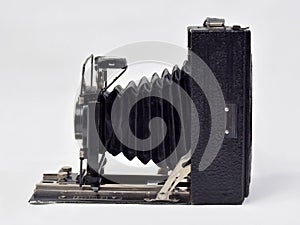 Vintage camera in black on a white background