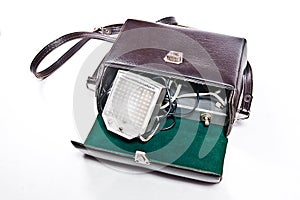 Vintage camera flash isolated on white.