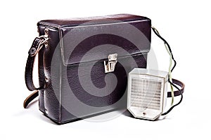 Vintage camera flash isolated on white.
