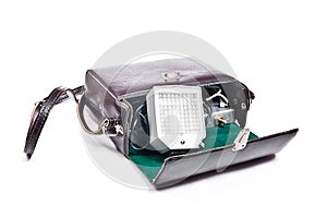Vintage camera flash isolated on white.