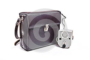 Vintage camera flash isolated on white.