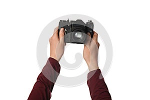 Vintage camera in hand isolated on white background. Photography and memories