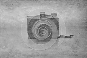 Vintage camera with paper filter applied to photo