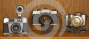 Vintage camera trio from three decades