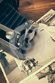 Vintage camera on wooden background