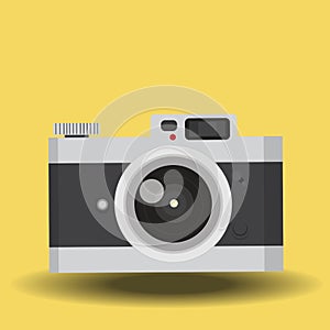 Vintage camera yellow background