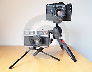Vintage cameras on tripods