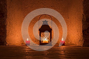 Vintage candlelit in metal lantern photo