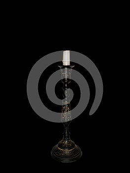 Vintage candlestick on black background