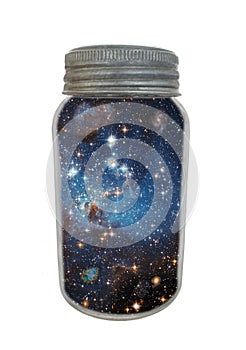 Vintage canning jar containing universe isolated. photo