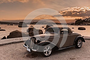 Vintage car 1951 at sunset