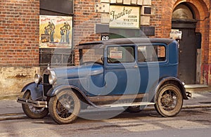 Vintage Chevrolet Car Against 1940s Backdrop