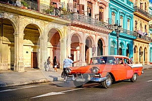 Vintage car and colorful buildings in Old Havana