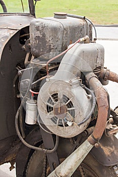 Vintage car engine on the front wheel