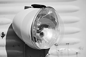 Vintage car headlight in black and white