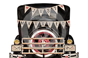 Vintage car with just married decoration