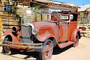 A vintage car left abandoned near the Hackberry General Store. Hackberry General Store is famous stop on the historic Route 66