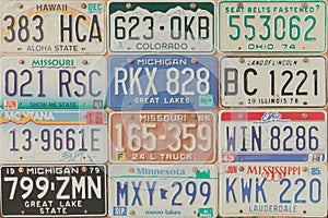 Vintage car license plates on a wall