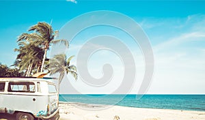 Vintage car parked on the tropical beach