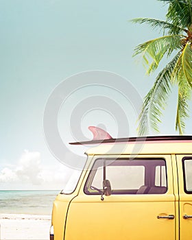 Vintage car parked on the tropical beach